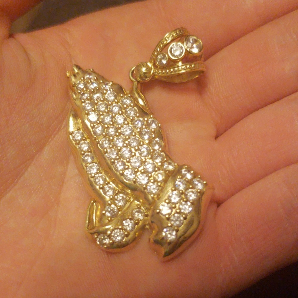 Q0k gold praying hands